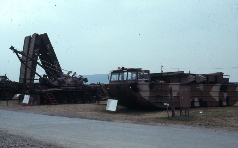 <p>Engineering equipment, left to right: assault bridge, tank retriever, amphibious bridge section.</p>